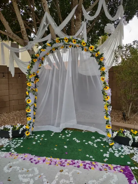 Floral wedding arch designed by Linda